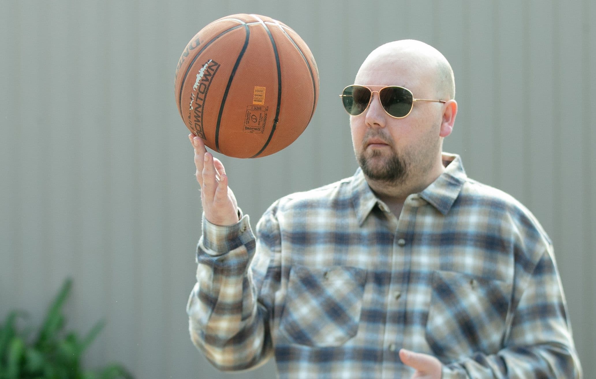 Man learning basketball skills